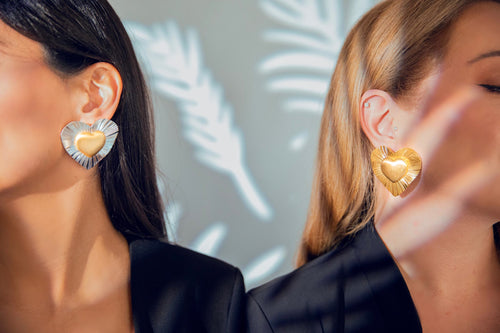 A l'Amour heart earrings in gold inside silver, and in gold