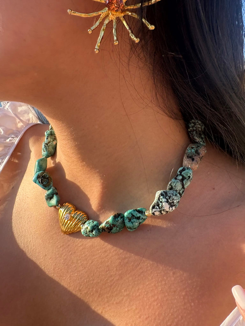 Aquaheart necklace in unpolished turquoise with a gold heart charm