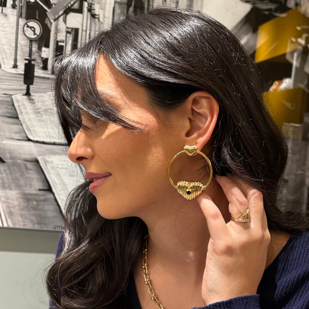 Hoops earring worn in profile