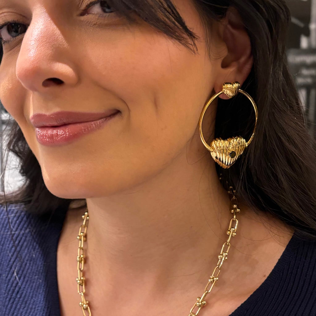 Hoops earring with signature heart charm