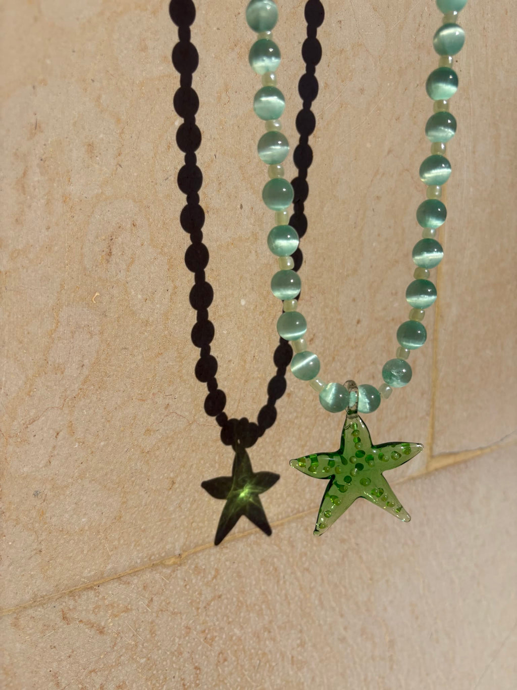 Starfish necklace with a hand-painted light green glass starfish