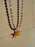 Starfish necklace with a hand-painted orange glass starfish