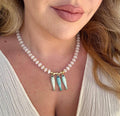 Trois Poissons necklace with three fish charms