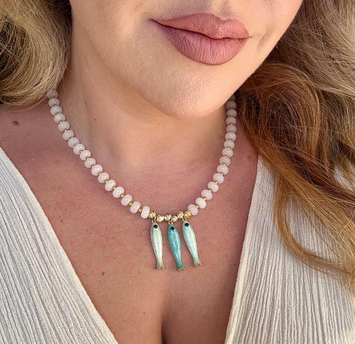 Trois Poissons necklace with three fish charms